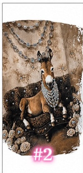 Bling tee design #2 — donkey in pearl necklaces lounging on a leopard-print couch