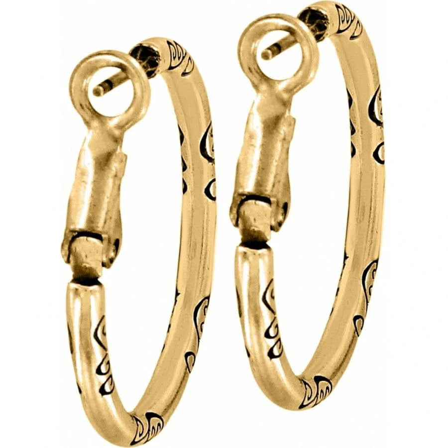 Gold hoop earrings with intricate designs on a white background