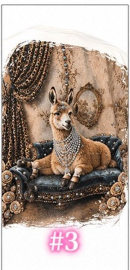 Bling tee design #3 — llama in pearls relaxing on a tufted vintage settee with gold drapes