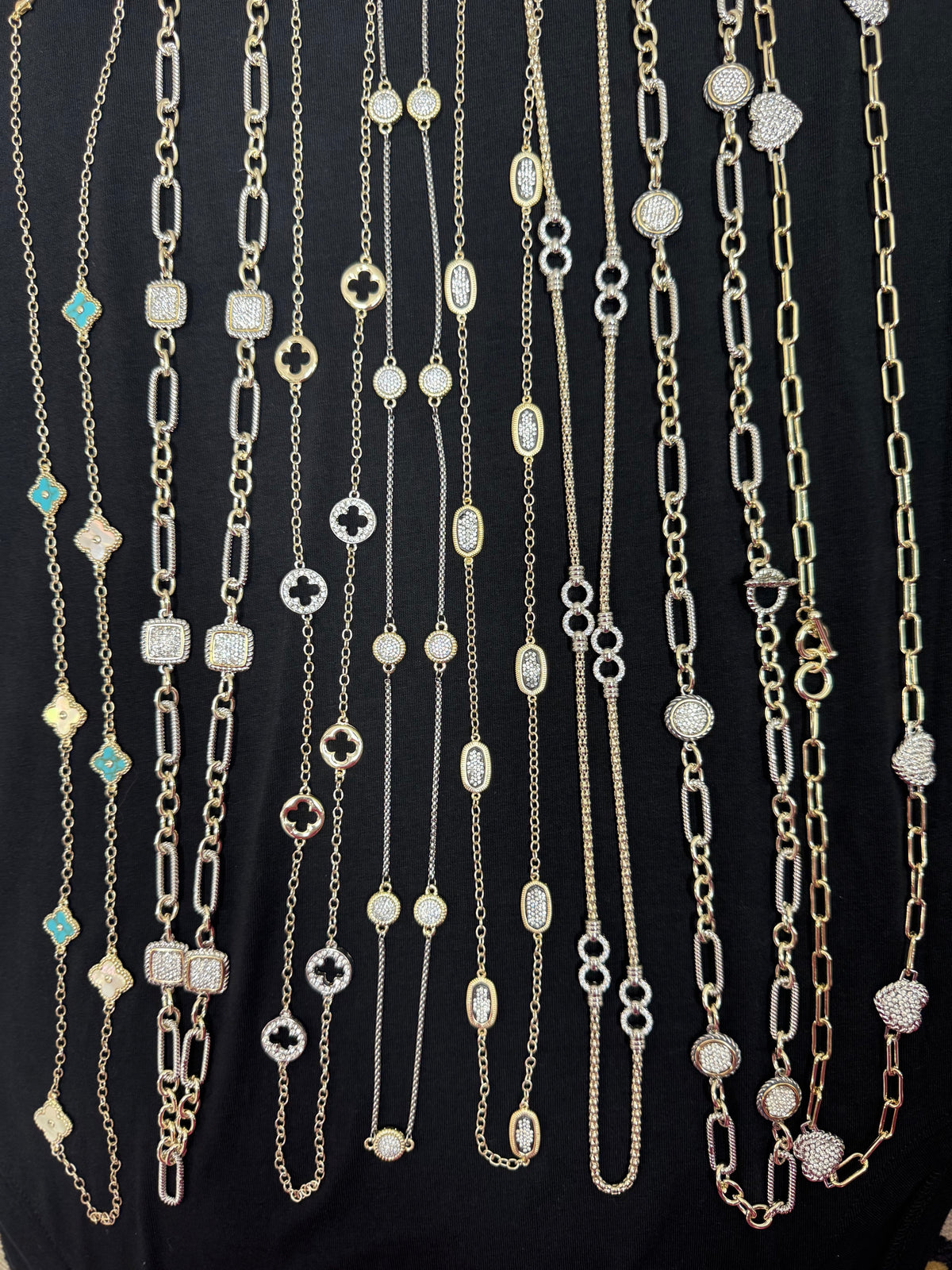 Assorted long chain and pendant necklaces