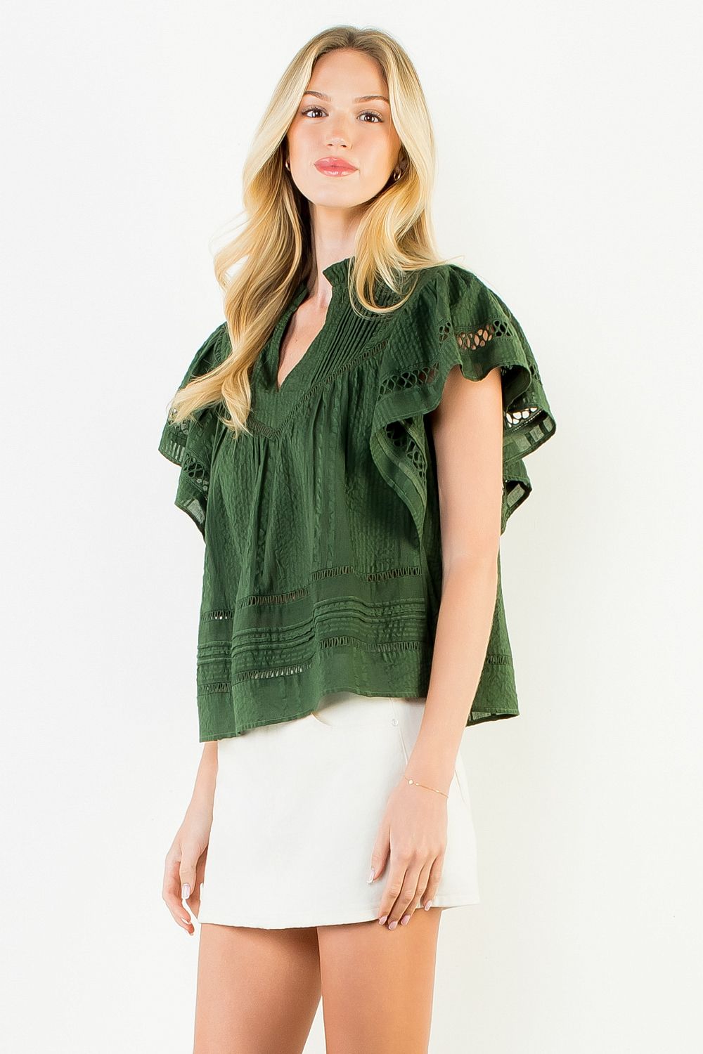 Olive green V-neck top with fluttered cut-out shoulder detail