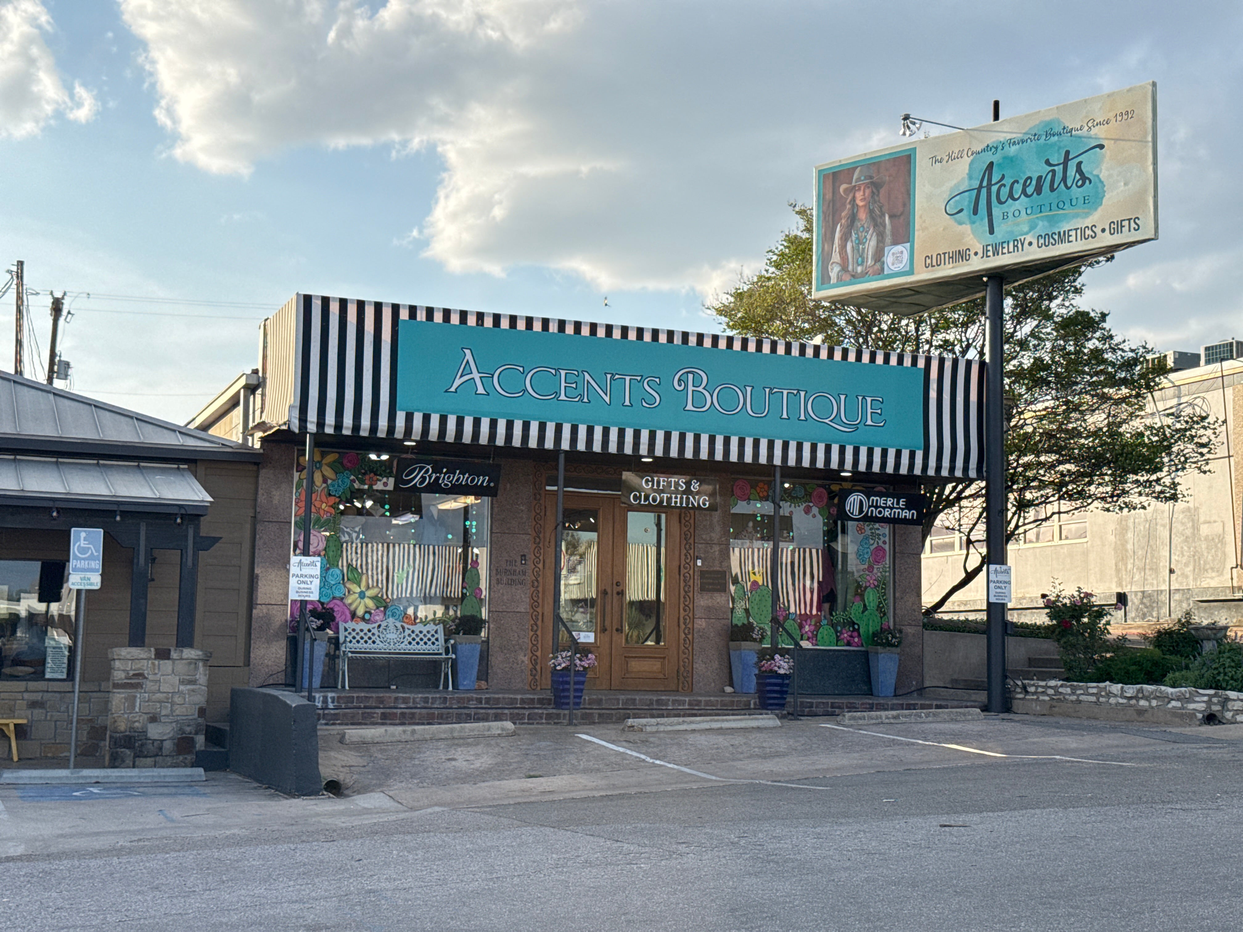 Accents Boutique with a sign and outdoor display
