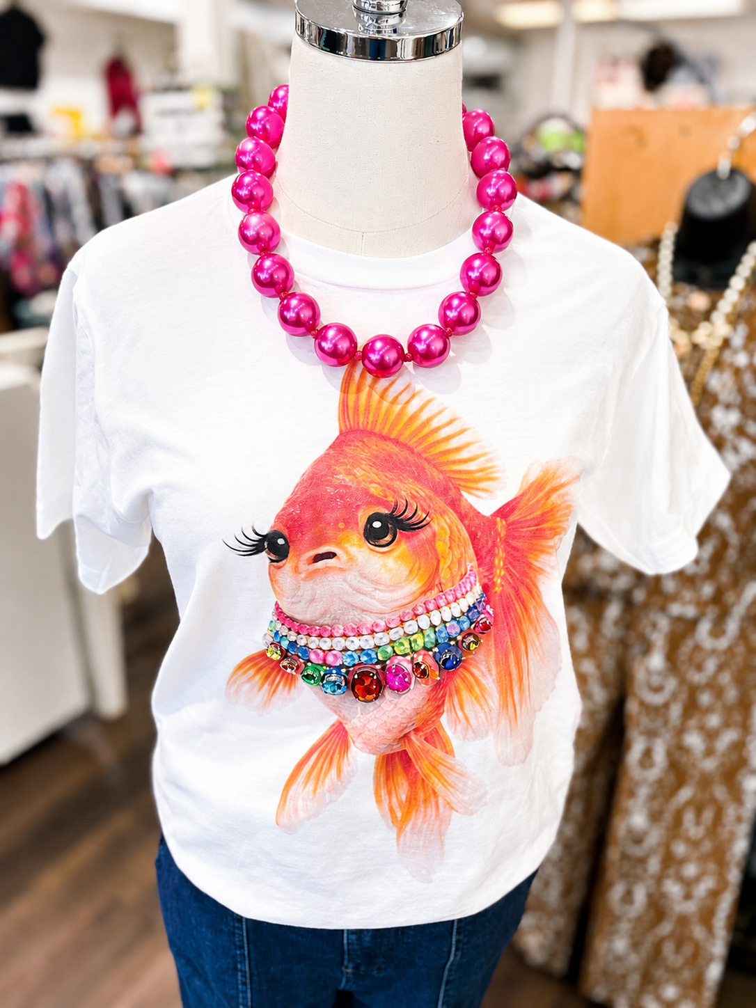 Jeweled collar T-shirt with a goldfish graphic