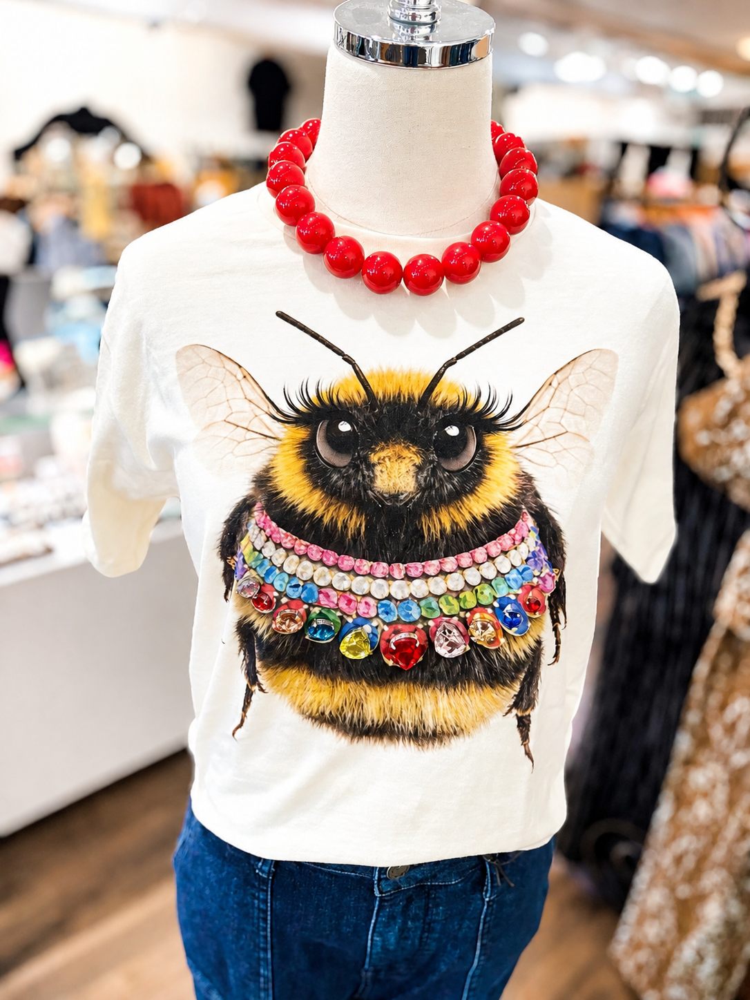 Jeweled collar T-shirt with a bee graphic