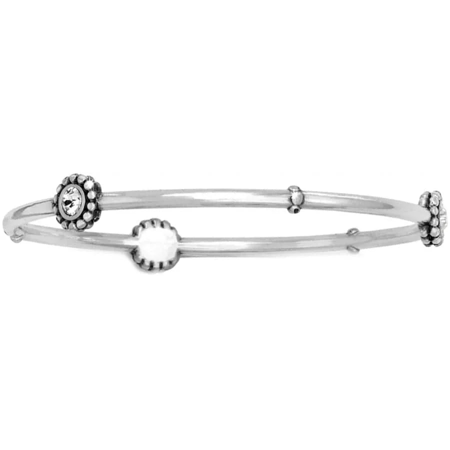 Silver bracelet with decorative elements on a white background