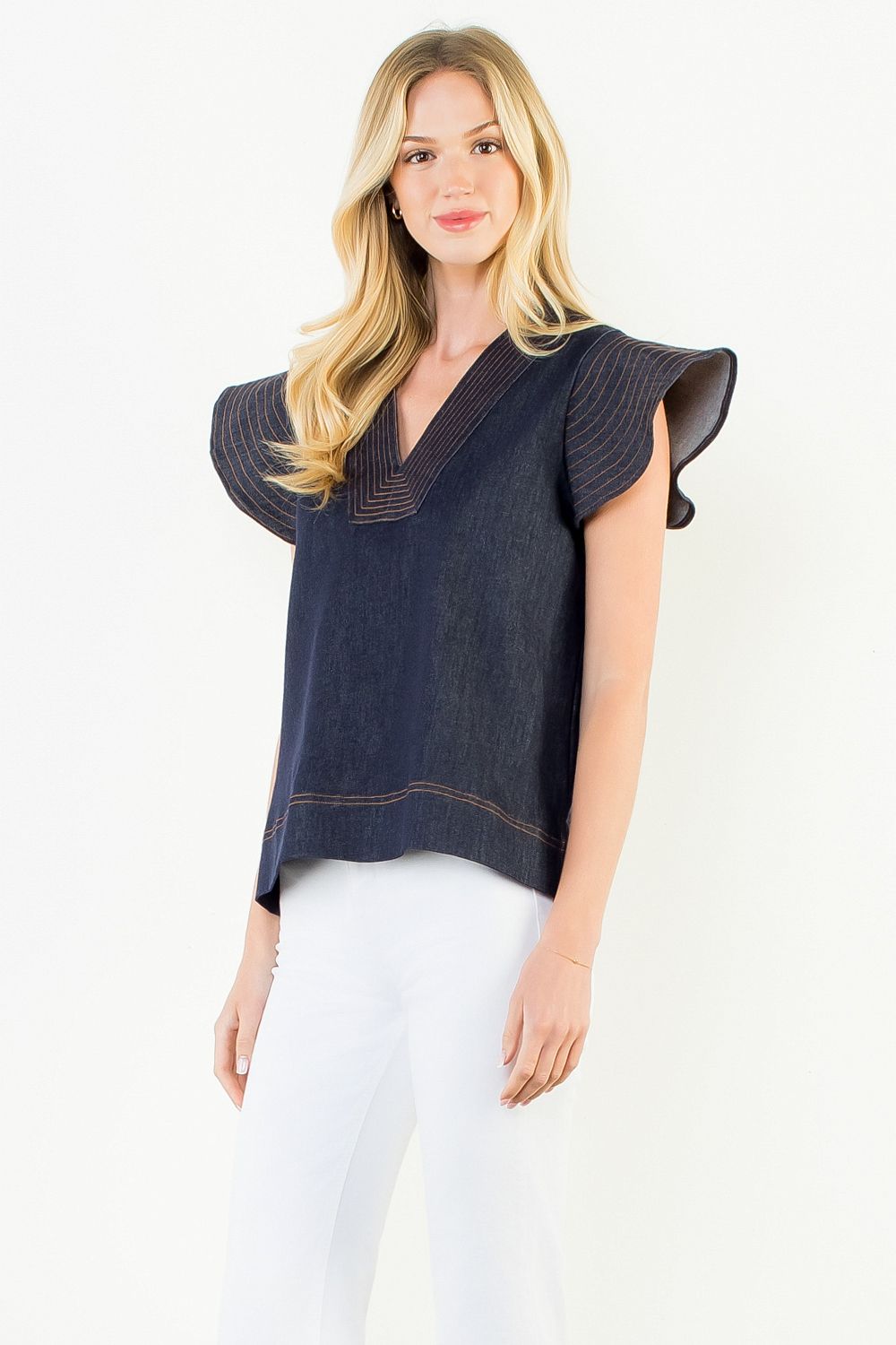Midnight denim flutter sleeve top with contrast stitching — view 2