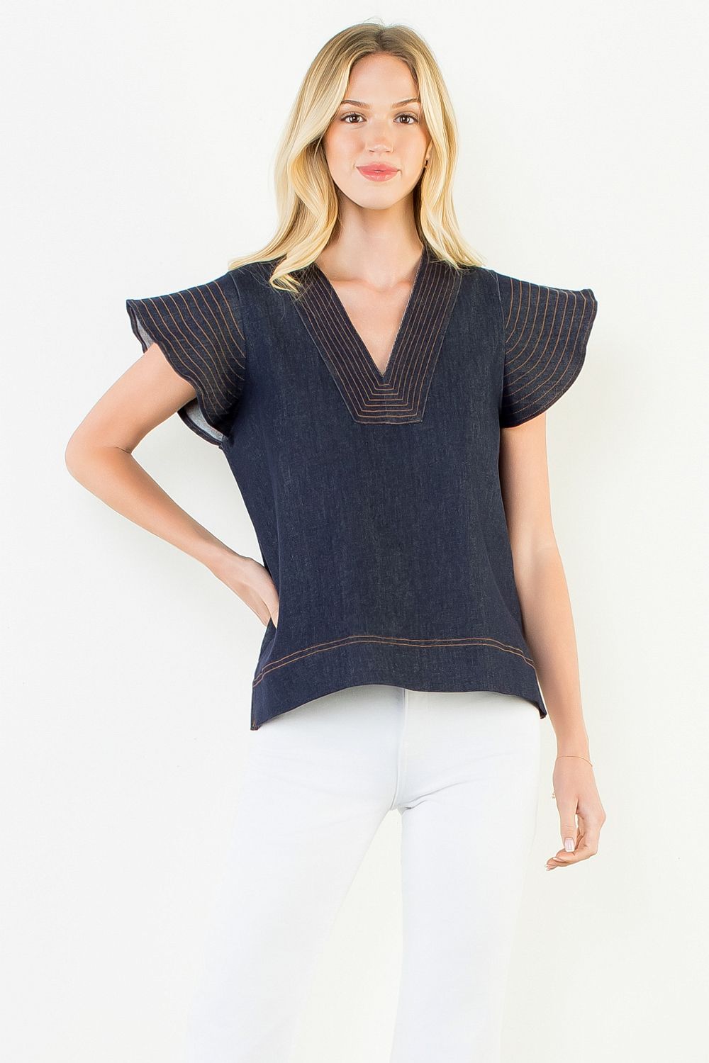 Midnight denim flutter sleeve top with contrast stitching — view 4